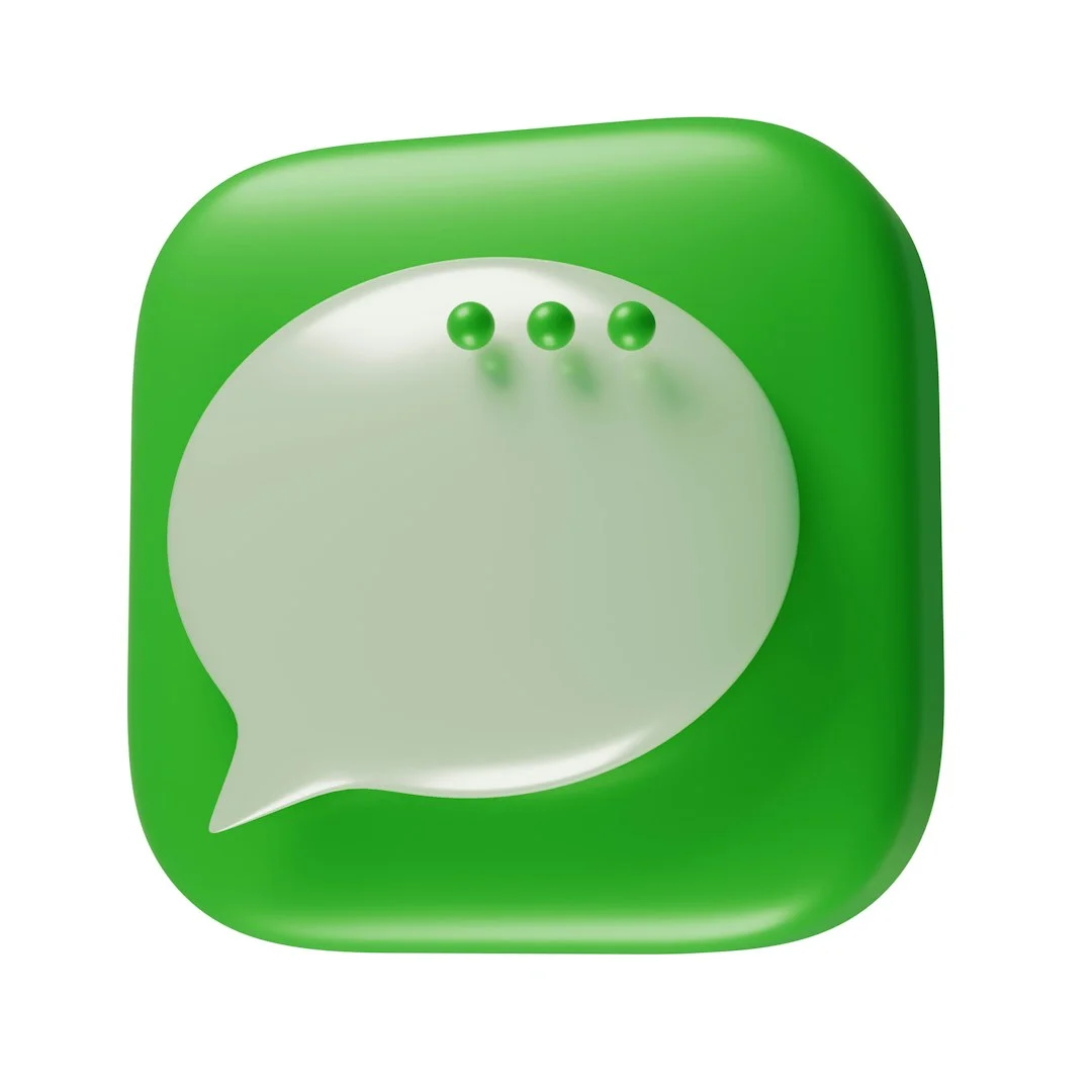 A green square button with a white speech bubble